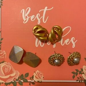 Three pairs of costume earrings one clip on the other two have no backs